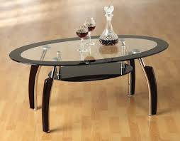 This modern oval coffee table is suitable for apartments, homes or offices. 5 Reasons To Buy Black Glass Coffee Table With Black Legs