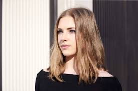 This can be considered a medium length version of a classic long hair look with a middle parting. How To Style Medium Hair 6 Looks To Elevate Your Mane Game