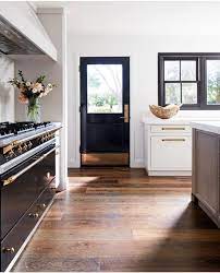 Becky Owens Kitchen Black Door With Brass Kick Plate Black Windows Black Interior Doors Interior Design Kitchen Kitchen Design