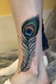 Pin By Lynn Wigfield On Tattoo For The Surgical Scar Peacock Tattoo Skin Color Tattoos Peacock Feather Tattoo