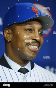 Willie Randolph dons a New York Mets' cap after being named the Mets' new  manager during a press conference at Shea Stadium November 4, 2004 in New  York City. Randolph, the first