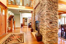 It gives the entire wall a cohesive look, and a lot of function at the same time. Is Stone Veneer Worth It Stone Interior Walls Pros And Cons Home Decor Bliss