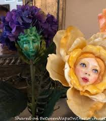 My best friend is having an alice in wonderland themed party for my god daughter's first birthday. A Whimsical Alice In Wonderland Table Setting Featuring Singing Talking Flowers From The Garden Between Naps On The Porch