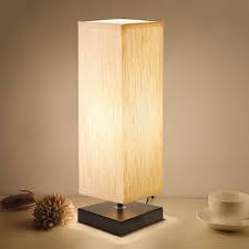 A banded square shade adds a contemporary touch to the rustic style of this table lamp. 25 Best Bedside Table Lamps To Light Up Your Evenings In 2021