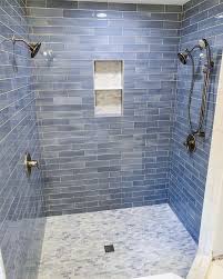 Step Into The Refreshing Shower Oasis Below The Glistening Blue Humboldt Glass Subway Tiles Lighten The Atmosph Blue Bathroom Tile The Tile Shop Shower Remodel