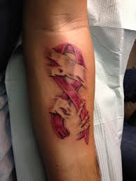 Such a design is always fun and chic and you would definitely want to a pink colored ribbon is used and it appeals to girls as well. Tatto Cancer Ribbon Tattoos For Men