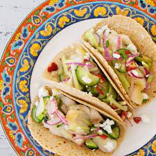 Once everything is ready, you just have to assemble the tacos by laying some of the flaked fish on your tortilla, then. Flaky Fish Tacos With Vegetable Slaw Recipe The Mom 100