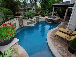This compact pool maximizes the small backyard with all the features of a larger backyard. Pin On Pool Ideas