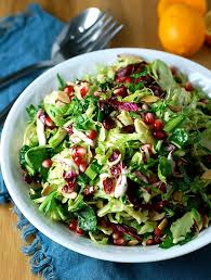 Shredded Brussels Sprouts With Meyer Lemon And Pomegranate Turnip The Oven Recipe Shredded Brussel Sprouts Vegan Christmas Recipes Pomegrante Recipes