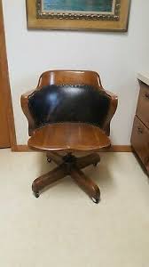 Executive swivel office chair with contoured back and seat. 1900 1950 Oak Swivel Desk Chair Vatican