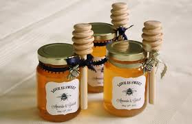 We take small jars of pure grade a clover honey and add personalized labels to create a unique little gift. Diy Honey Jar Wedding Favors Wedding Wednesday Life At Cloverhill