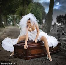 Beautiful girls in their caskets. The Creepiest Calendar Ever Scantily Clad Models Pose With Coffins To Advertise Casket Company Daily Mail Online