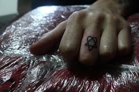 Check spelling or type a new query. Heartagram Tattoo On Middle Finger