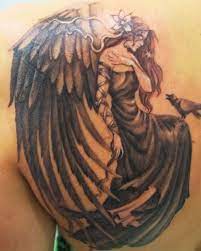 15 Awesome Angel Tattoo Designs Pictures Sheideas Angel Tattoo Designs Guardian Angel Tattoo Angel Tattoo