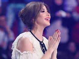 See actions taken by the people who manage and post content. Nancy Ajram S Best Hair And Makeup Looks Vogue Arabia