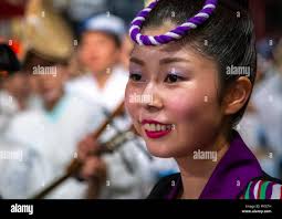 Japanese girl during the Koenji Awaodori dance summer street festival,  Kanto region, Tokyo, Japan Stock Photo