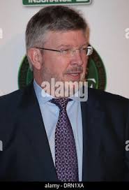 London, UK. 29th January 2014. Steve Soper along with his family attend the  MotorSport Hall Of Fame 2014 charity auction Credit: Keith Larby/Alamy Live  News Stock Photo