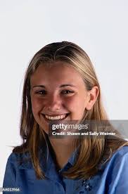 Closeup Of A Teen Girl Smiling High-Res Stock Photo