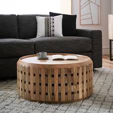 Opt for square metal styles or round glass for your bed or a sofa side, or browse our pretty vases to create a statement corner. Pierced Wood Drum Side Table Coffee Table Living Room Furniture Tables Contemporary Coffee Table
