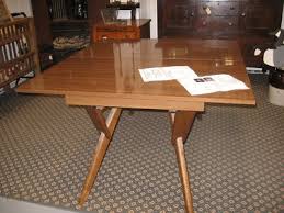 These convertible coffee tables offer this convenience because they can also be used as a small desk. 1950 S Castro Convertible Coffee Table Dining Table 141739128