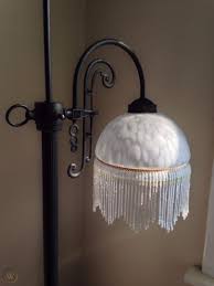 It delights with its impressive condition, withstanding successfully the test of time. Victorian Style Floor Lamp Beaded Fringe White Mottled Glass Shade Brass Base 1888335477