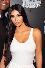 Kim Kardashian With Long Hair And Soft Waves Hair Style And Glamorous Makeup Look Long Hair Styles Kim Kardashian Style Kardashian Style