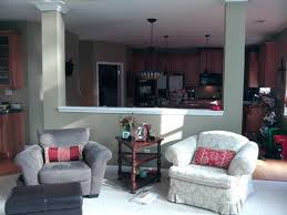 And, with a narrow entry arch into the kitchen. Half Wall