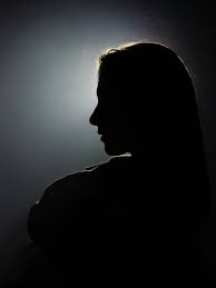 A silhouette of a woman in the dark photo – Free Portrait Image on Unsplash