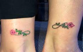 Mother Daughter Tattoo Each Other S Birth Flowers And Infinity Stem Tattoos For Daughters Mother Daughter Tattoos Birth Flowers