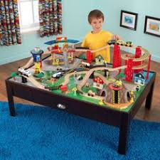 There's even an area to place a plastic mounting setting with a moveable crane and working winch. 13 Toys Ideas Toys Cool Toys Train Table