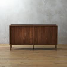 Scandi design, cb2 mercer credenza is made of rotary cut walnut veneer in a rich midtone stain. Mercer Credenza Cb2