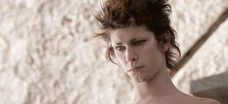 How does Shakespeare use magic, alongside comedic devices, to portray  romantic love in the plays 'A Midsummer Night's Dream' and 'The Tempest'?