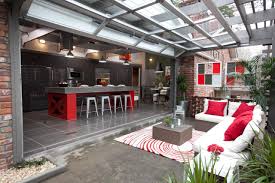 Off the outdoor living space is a complete kitchen and bar area with a dining spot, perfect for entertaining. 10 Gorgeous Backyard Kitchen Designs Diy Network Blog Made Remade Diy