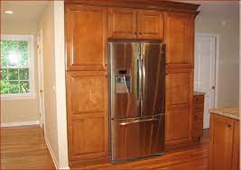 That's where an also less than schmancy $19 cabinet from the habitat for humanity restore (mentioned yesterday) came in handy.it's 12″ tall and 36″ wide, the exact width of our fridge. The Best Functional Overhead Fridge Cabinet Solutions Mecc Interiors Inc