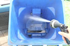 Dip a scrub brush into the cleaning solution and give the outside a good scrubbing. How To Clean Outdoor Garbage Cans And Keep Them Clean