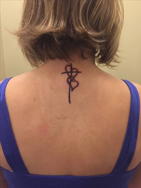 Back of neck tattoo, hearts, cross