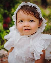 Sweet peaches and sunshine kisses—could she be any more precious? Little  Lilly, named after a flower, carries the sweetness of a Washington peach  and the light of a summer morning. Spending time