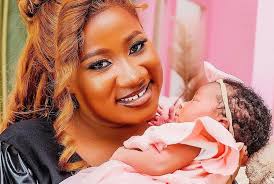 Chosen Becky announces arrival of her baby girl four days after putting to  bed