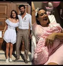 Baris Arduc S Wife Gupse Ozay On The Hospital S Bed Holding Her Newborn After Denying They Re Expecting Pictures Al Bawaba