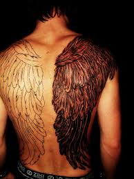 The angel wing tattoo on the chest of this guy is applied with elegance and a unique touch of art. Wings Tattoo On Back