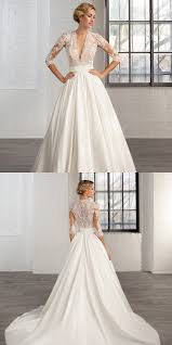 Tiny pearls embellish the high neckline. Awesome Vintage Wedding Dress Best Photos Tight Wedding Dress Wedding Dresses Vintage Beautiful Wedding Dresses