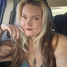 ISO doggy day care with live web cameras near Greer?