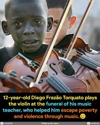 The image of the child musician crying was classified as one of the most  emotional photographs of modern history. This photo was taken of a  12-year-old Brazilian boy (Diego Frazzo Turkato), playing