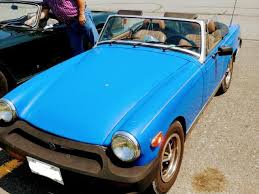 Image result for Tahiti Blue 1977 MG