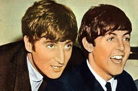 What was the first song John Lennon played for Paul McCartney?