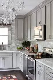 Raised panel cabinets are the perfect choice for a traditional kitchen. Gray Kitchen Features Gray Raised Panel Cabinets Paired With Viatera Snow Storm Quartz Counterto Kitchen Renovation Kitchen Design Decor Kitchen Cabinet Design