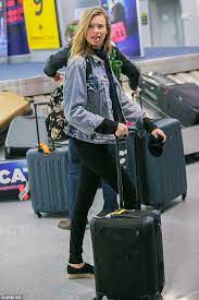 Behati Prinsloo Sticks Her Tongue Out As She Touches Down In New York Behati Prinsloo Style Fashion Behati Prinsloo