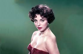 She spends his money on her nightclub, the hobo, and partying. Joan Collins Turner Classic Movies