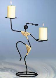 With a wide variety of styles and designs available, these metal candle holders will complement any theme and enhance the look of the party decorations up a notch. M Candle Holders Metal Candle Holders Candle Stand