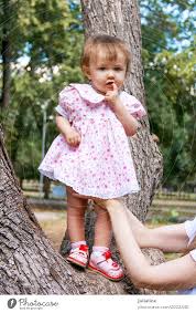 Cute Infant In Pink Dress A Royalty Free Stock Photo From Photocase